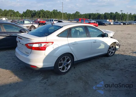 2014 Ford Focus Titanium from USA, damaged, VIN 1FADP3J27EL221699
